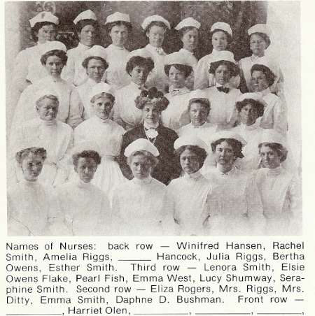 Black-and-white group photo of twenty women nurses, dressed in uniforms, posed in three rows with names listed below the image.