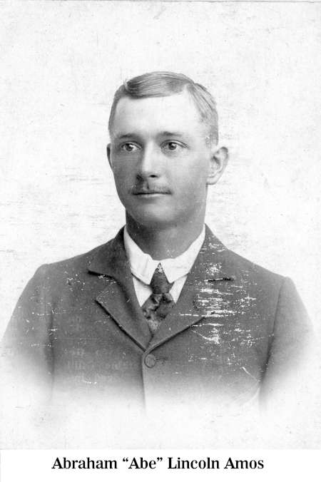 Black and white portrait of a man in a suit and tie with short hair and a mustache, facing forward. Text below reads: "Abraham 'Abe' Lincoln Amos.