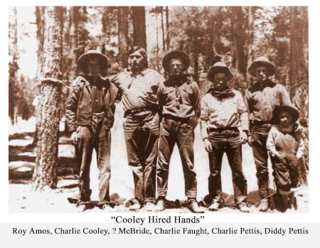 Five men stand outdoors in a wooded area, posing for a group photo titled "Cooley Hired Hands"; names are listed below the image.