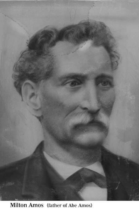 Black and white portrait of an older man with wavy hair, a mustache, and a suit jacket. The label below reads, "Milton Amos (father of Abe Amos).
